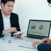 teamwork with business people analysis cost graph on desk at mee